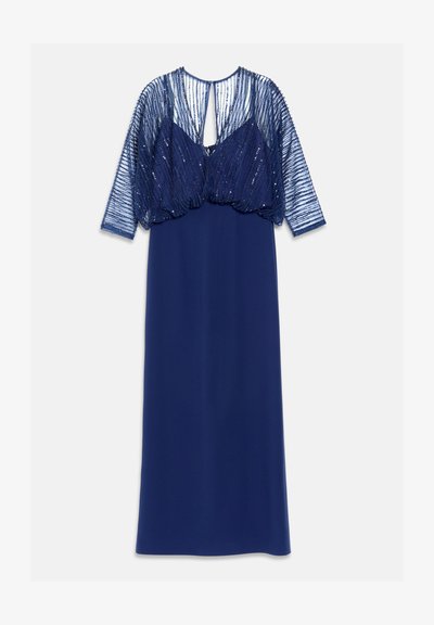 Longue robe bleu marine avec un voile transparent orné de perles sur le haut du corps et les manches, avec un décolleté en trou de serrure et une jupe fluide.