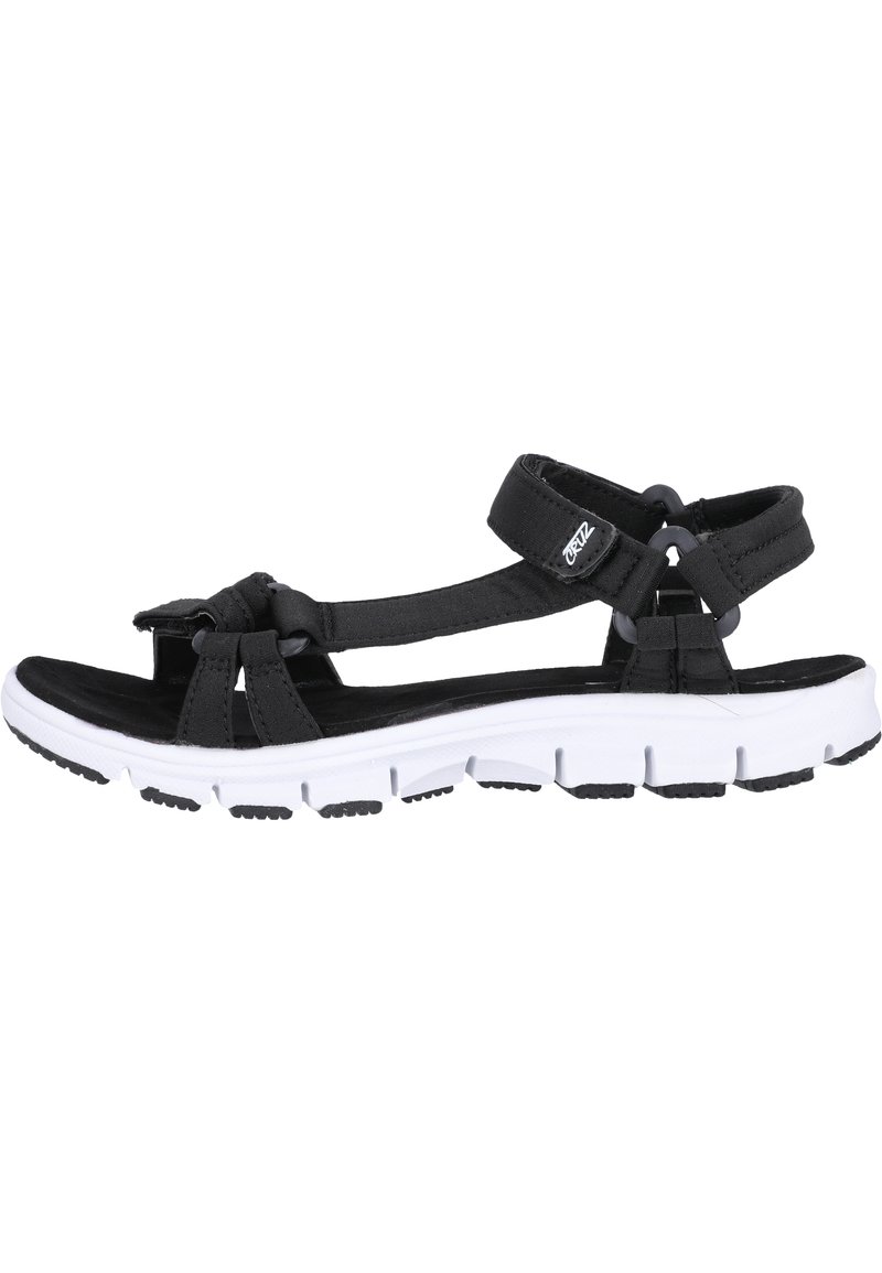 Black sandal with a fabric upper and adjustable straps, featuring a white and black cushioned sole with textured tread.