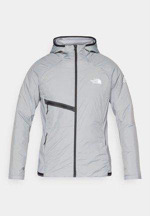 Light gray insulated jacket with a hood, front zipper, and black accents. Features a chest pocket and logo on the left side. Smooth texture.
