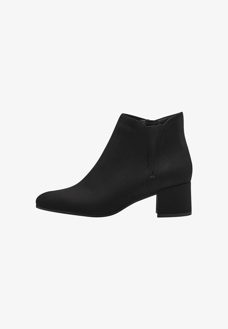 Bottine noire en matériau synthétique lisse, avec un bout pointu, des panneaux latéraux élastiques et un talon bloc. Design simple et minimaliste.
