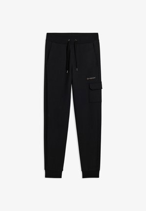Pantaloni jogger neri realizzati in tessuto morbido, con vita elastica e cordoncino, tasche laterali e una tasca cargo sulla gamba destra.