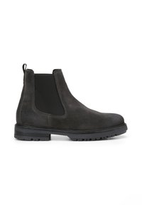 Bottines Chelsea en suede gris foncé avec panneau élastique noir sur les côtés, languette à l'arrière et semelle noire épaisse avec crampons.
