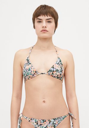 Floral bikini featuring a triangular top and tie-side bottoms, made of lightweight fabric in pink, green, and black with a vibrant pattern.