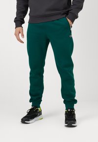 Champion ICONS CUFF PANTS - Treniņtērpa apakšdaļas - green