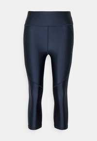 Tummansiniset capri-legginssit, joissa on sileä, kiiltävä pinta, korkea vyötärönauha ja saumattomat paneelit istuvan muotoilun takaamiseksi.