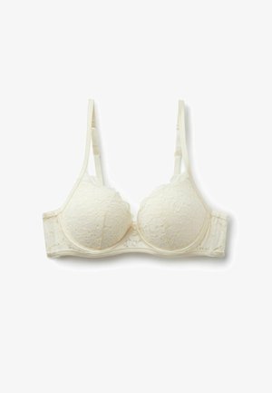 Biustonosz z kremowej koronki z fiszbinami i regulowanymi ramiączkami, rozłożony na płasko na białym tle.