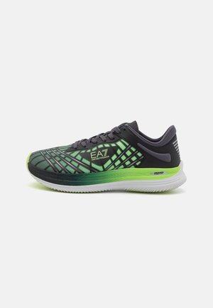 Running shoes with a mesh upper in gradient green and black, featuring a geometric pattern, cushioned sole, and EA7 branding.