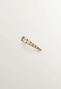 Horquilla en tono dorado con forma de cono puntiagudo, que presenta cinco cristales redondos y transparentes incrustados a lo largo de su longitud. Textura metálica suave.
