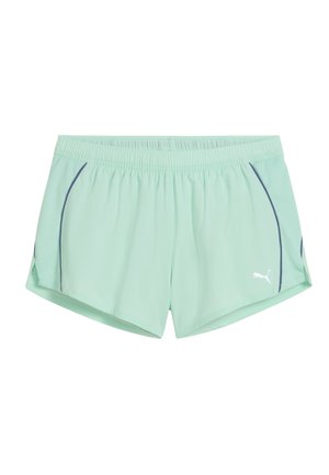 Pantalones cortos deportivos de color verde menta claro con cintura elástica, textura de malla y líneas de acento en azul marino. Presenta un logo de marca blanco en un lado.