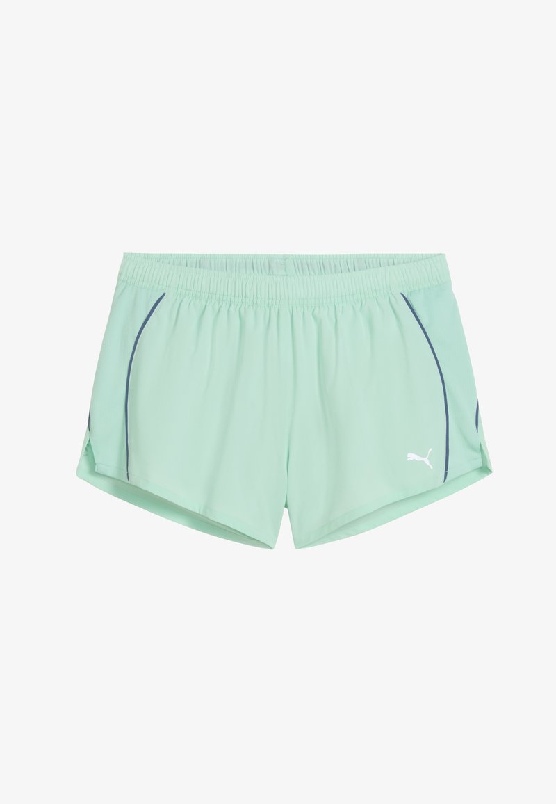 Pantalones cortos deportivos de color verde menta claro con cintura elástica, textura de malla y líneas de acento en azul marino. Presenta un logo de marca blanco en un lado.