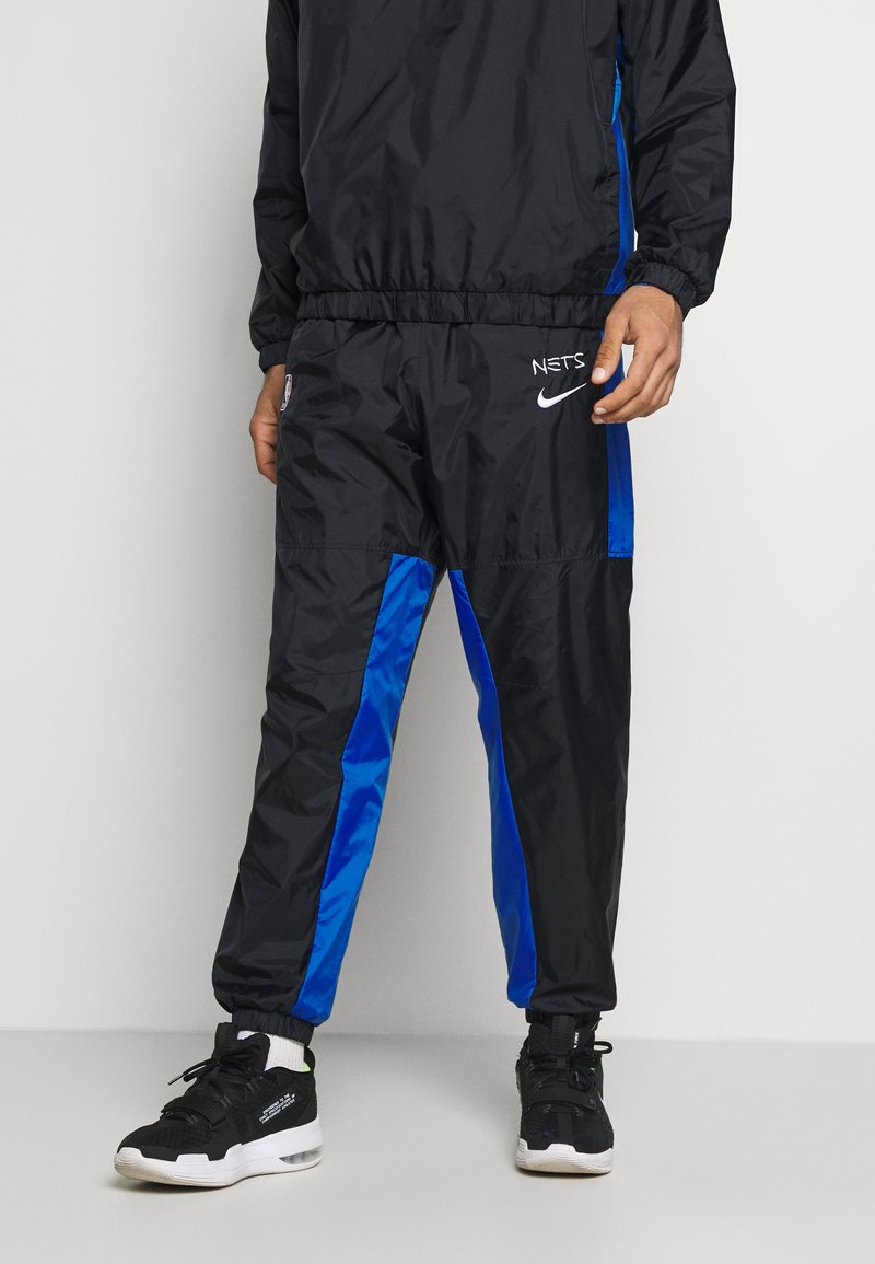 Nike Performance Nba Brooklyn Nets City Edition Tracksuit Trainingsanzug Black Royal Blue University Gold Schwarz Zalando De