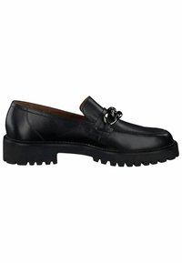 Mocassin en cuir noir avec semelle épaisse et détail de chaîne métallique argentée à l'avant, vue côté extérieur.