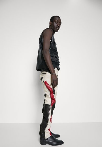 STUDIO ID ANTOINE BIKER TROUSERS - Usnjene hlače - black/red/off white