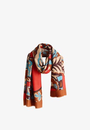 Longue écharpe avec des motifs floraux et feuilles audacieux en rouge, marron, bleu clair et beige, bouclée de manière lâche.
