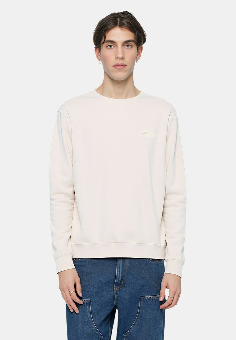 Felpa color beige chiaro in cotone con scollo rotondo, polsini e orlo a costine, con un piccolo logo ricamato sul petto.