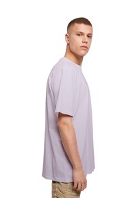 Merchcode HEARTBREAK HEAVY  - Triko s potiskem - lilac