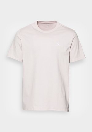 Light pink cotton t-shirt with short sleeves, round neckline, and small white logo on the left chest. Soft texture and classic fit.