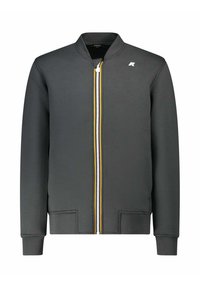 Giacca grigia con zip e colletto rialzato, caratterizzata da una zip con strisce bianche e gialle. Realizzata in tessuto liscio, con polsini e orlo a costine.