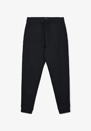 Pantaloni della tuta neri realizzati in materiale morbido, dotati di una vita elastica con cordoncino, due tasche laterali e polsini aderenti.