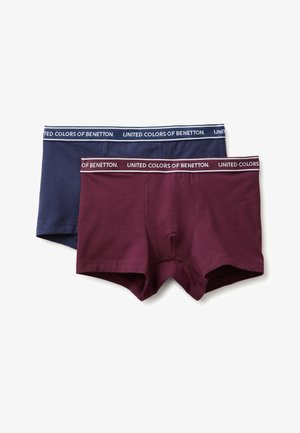 Deux paires de boxers pour homme en bleu marine et bordeaux, chacun avec une ceinture élastique de marque indiquant "United Colors of Benetton."