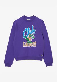 Purple sweatshirt featuring a large multicolored "Club Lacoste" graphic with a cartoon crocodile. Ribbed cuffs and hem. Cotton material.