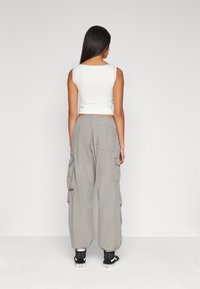 BDG Urban Outfitters BDG MAXI POCKET  - Trousers - charcoal