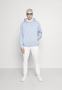 Weekday Sweatshirt com capuz - light blue