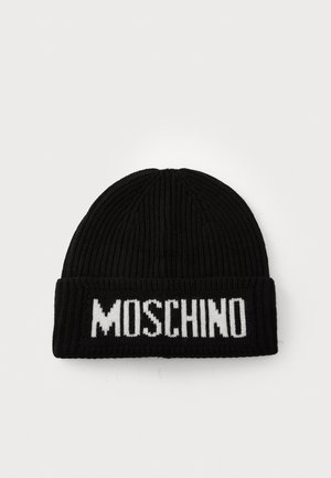 Black knitted beanie with a ribbed texture and a white "MOSCHINO" logo on the folded cuff, featuring a rounded top design.