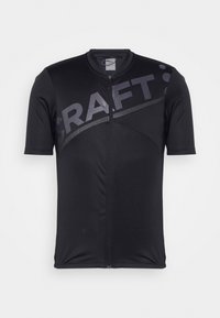 Maillot de cyclisme à manches courtes en noir avec fermeture éclair, affichant un logo "CRAFT" brillant et des éléments de design angulaires. Fabriqué en tissu extensible.