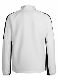 Weißes Jacket mit schwarzen Seitenstreifen, Kragen und langen Ärmeln. Hergestellt aus glattem Stoff mit leicht strukturierter Oberfläche.