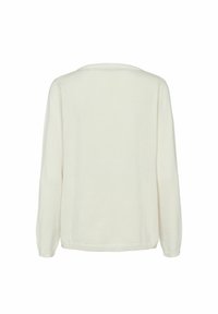 Haut à manches longues de couleur crème, avec un col rond, une texture douce et des poignets côtelés, avec une coupe décontractée et un design minimaliste.