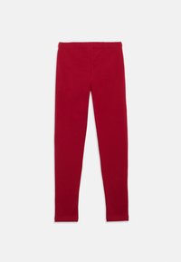 Rote Baumwoll-Leggings mit einem elastischen Bund. Glatte Textur, figurbetontes Design und lange Beine.