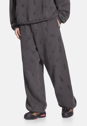 - Spodnie materiałowe