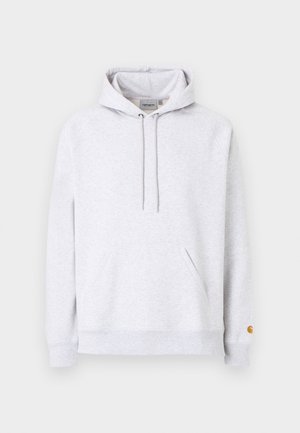 Helehall Carharti kapuutsiga pusa esikülje kängurutasku, paelaga kapuuts ja väike pruun logo vasaku varruka mansetil.