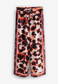 Lehké kalhoty se vzorem v černo-červeném abstraktním leopardím potisku, s elastickým pasem a kontrastními červenými okraji.
