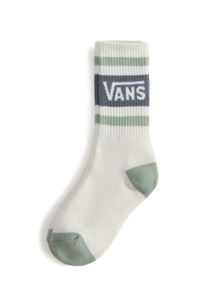 Vit bomullssocka med gröna och grå ränder. Har en rektangulär grå logotyp med "VANS"-text i vitt. Förstärkt grön tå och häl.