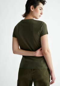 Liu Jo Jeans T-shirt con stampa - moss