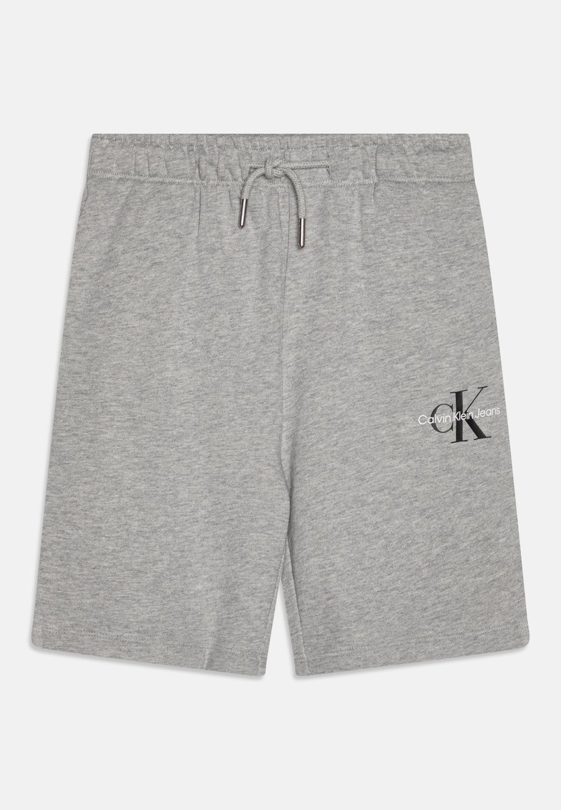 Sive bombažne hlače za prosti čas z elastičnim pasom in vrvico. Na spodnjem levem delu hlačnic je natisnjena odlična logo. Gladka tekstura.