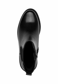 Bottines en cuir noir avec une finition lisse, bout arrondi, panneaux élastiques sur les côtés et une petite languette à l'arrière.