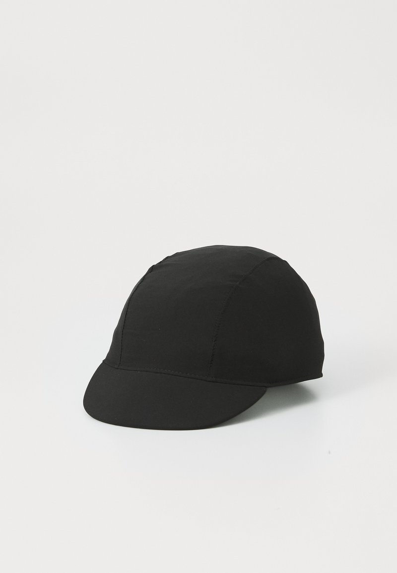 Black cycling cap made of lightweight fabric, featuring a curved brim and seamless construction with a smooth texture.