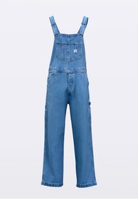 Vaaleansininen denim-hupparipuku, jossa leveät lahkeet, säädettävät olkaimet ja etutasku. Sileä pinta, jossa on vähäisiä kulutuksen merkkejä.