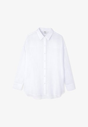 White collared shirt made of lightweight fabric, featuring long sleeves, full-button front, and a slightly curved hem.