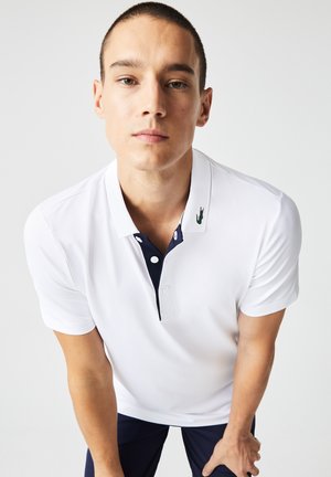 Lacoste Sport GOLF  - Polo - blanc   bleu marine