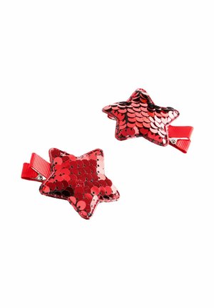 Red star-shaped hair clips covered in sequins, with a smooth texture and a bright red, textured ribbon clip on the back.