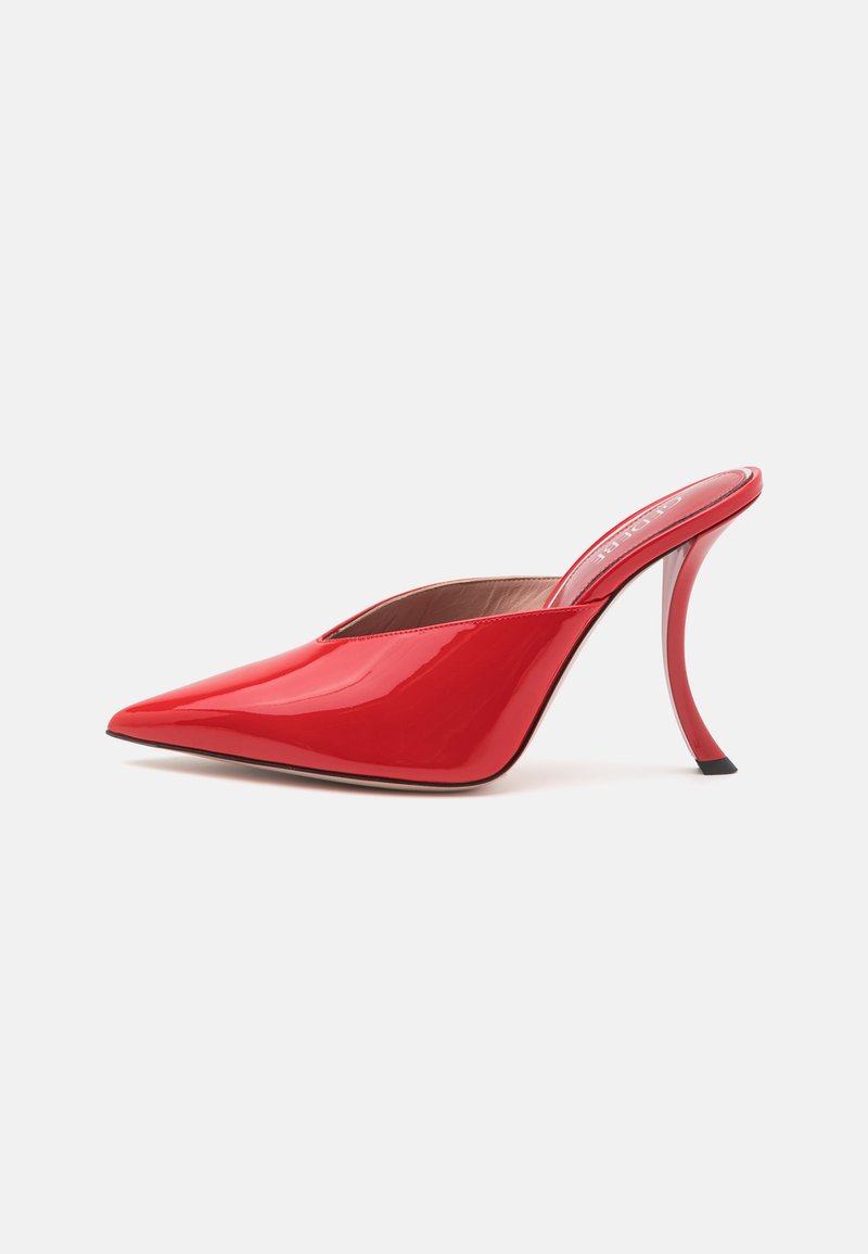 Red patent leather mule with pointed toe, open back, and a uniquely curved, high heel. Smooth texture and sleek design.