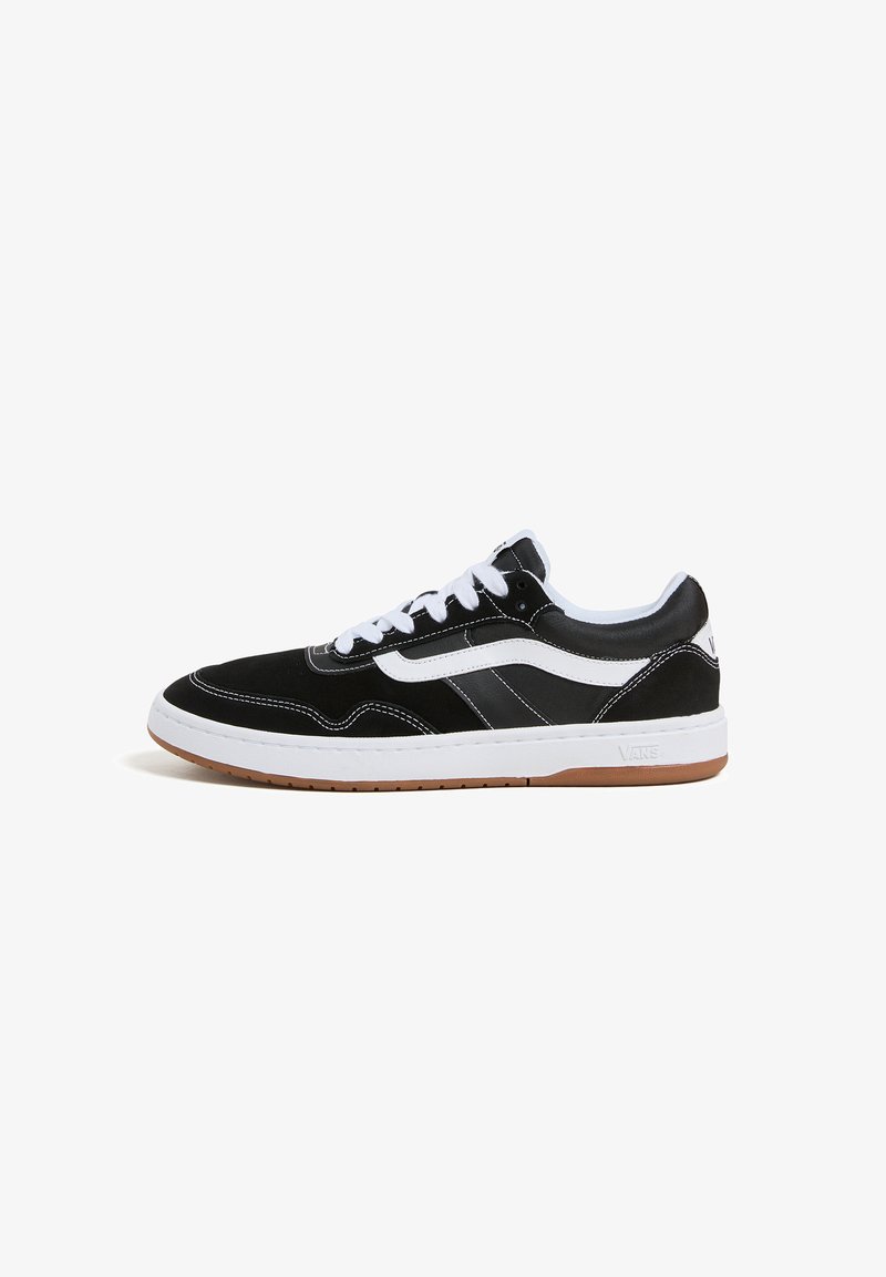 Mustad nahast ja suede tenis jalanõud valgete aktsentidega, madala disainiga, paeltega sulgemise ja kummi tallaga.