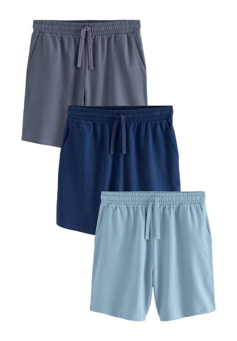 Tres pares de pantalones cortos: gris oscuro, azul marino y azul claro. Todos tienen una cintura elástica con cordón y bolsillos laterales. Tejido suave.