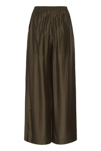 Pantalon ample taille haute à jambes larges en tissu brillant olive foncé avec une taille élastique et des poches latérales.