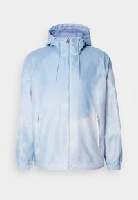 Hele sinine kapuutsiga vetthülgav jope, millel on sile tekstuur, elastsed varrukad ja gradientsed disain, mis üleminek kergemasse tooni.