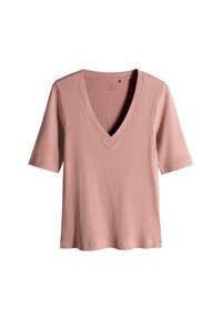 Žebrované růžové tričko s výstřihem do V, krátkými rukávy a volným střihem. Textura látky je měkká s mírným pružením, což zvyšuje komfort.